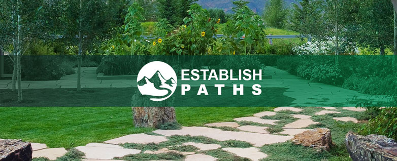 A grassy large stone pathway is seen trailing off into flowerbeds in the background, with a green banner overlayed with a white mountain trail icon over top with text right next to it reading "Establish paths"