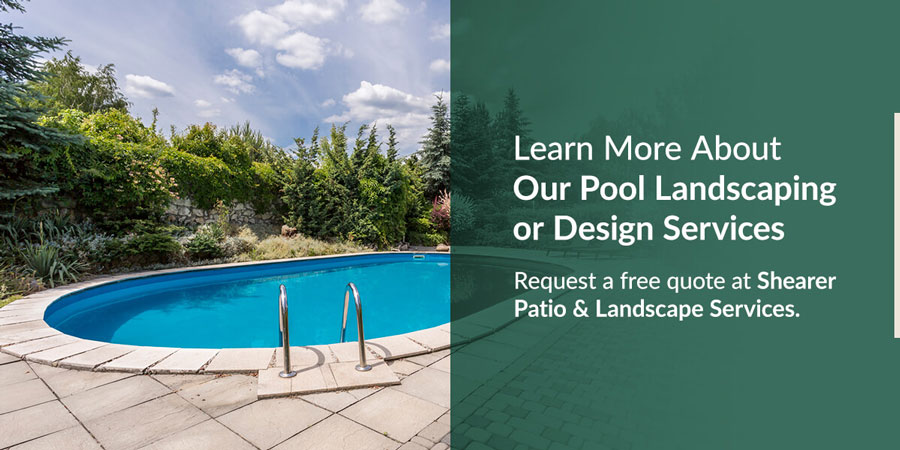 An empty inground pool surrounded by greenery on a bright sunny day with text saying "Learn More About Our Pool Landscaping or Design Services. Request a free quote at Shearer Patio & Landscape Services."