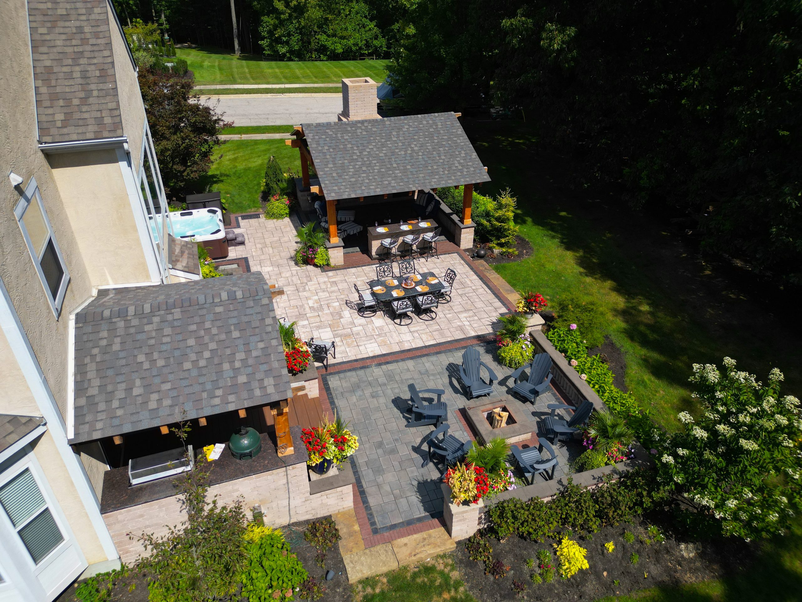 Top view of backyard with lawn, floral and plants decor